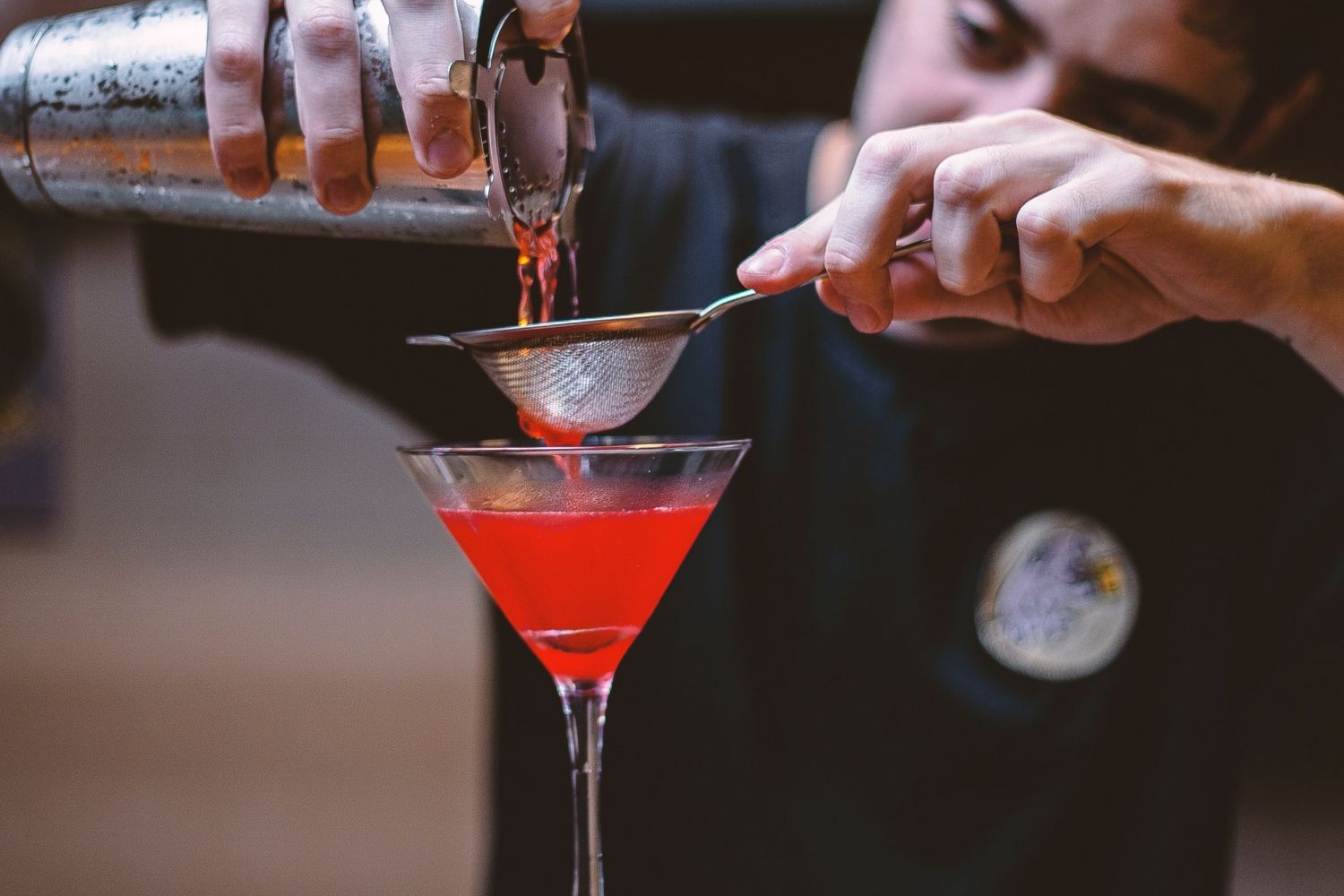 Cosmopolitan-cocktail-behind-a-bar.jpg