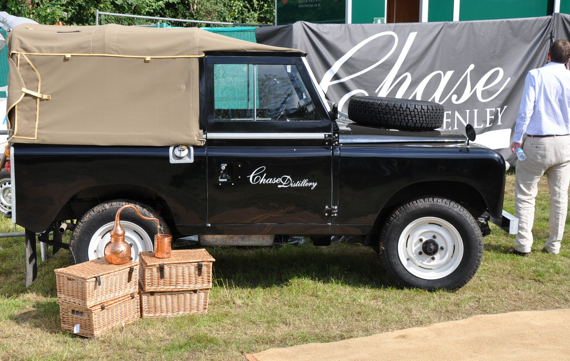 A landrover with the Chase Vodka Distillery Logo on it, at Henley Regatta