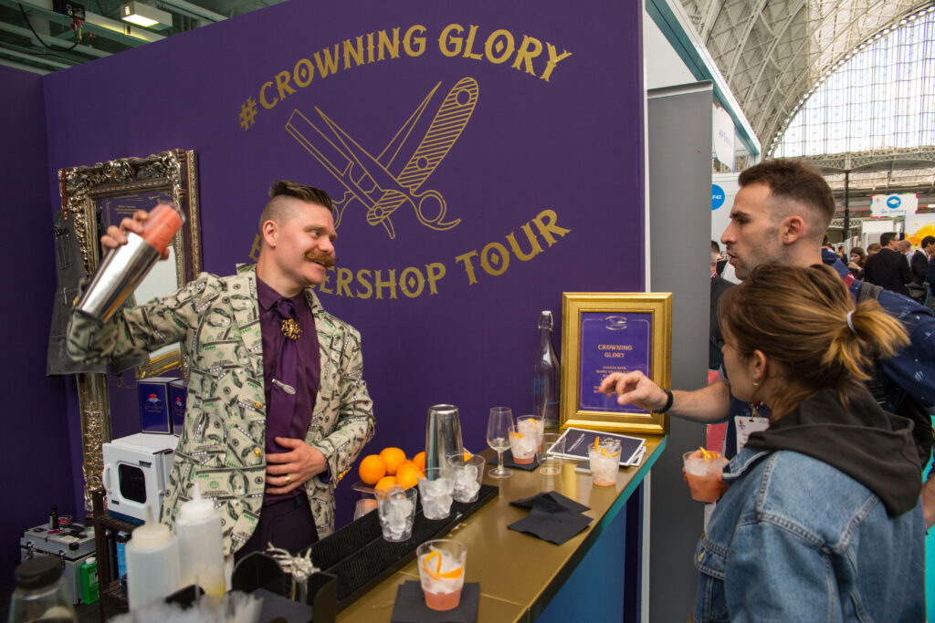 A brand ambassador from The Cocktail Service at the Crown Royal Stand at Imbibe live 2018